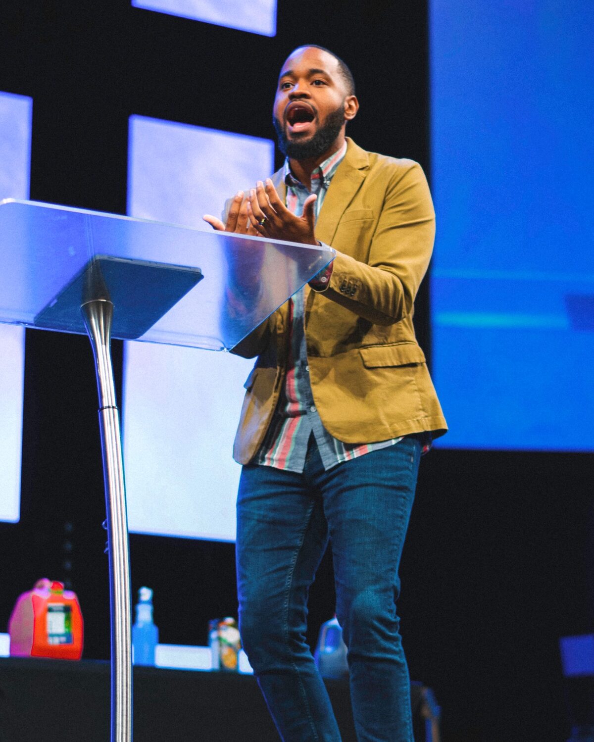 Xavier preaching at a podium